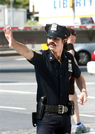 Illustration for article titled Karl Lagerfeld Wears Pink • Joe Jonas Joins The NYPD